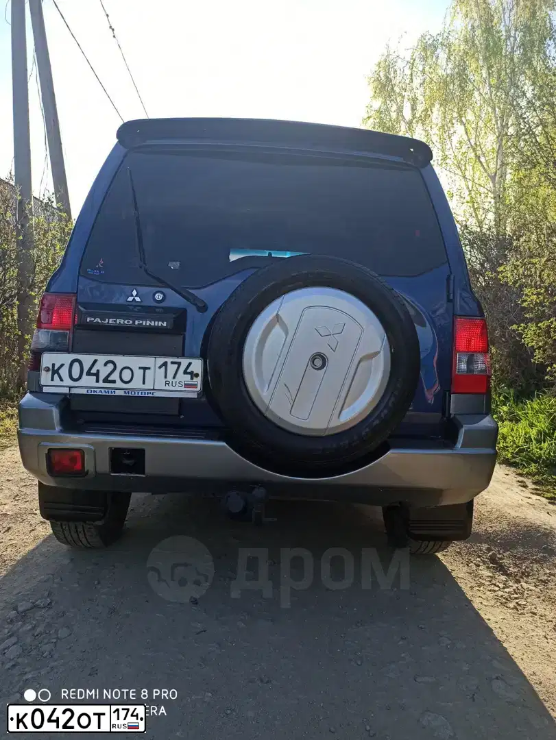 Фото автомобиля MITSUBISHI PAJERO PININ, 2004 — госномер К042ОТ174. Цвет: синий