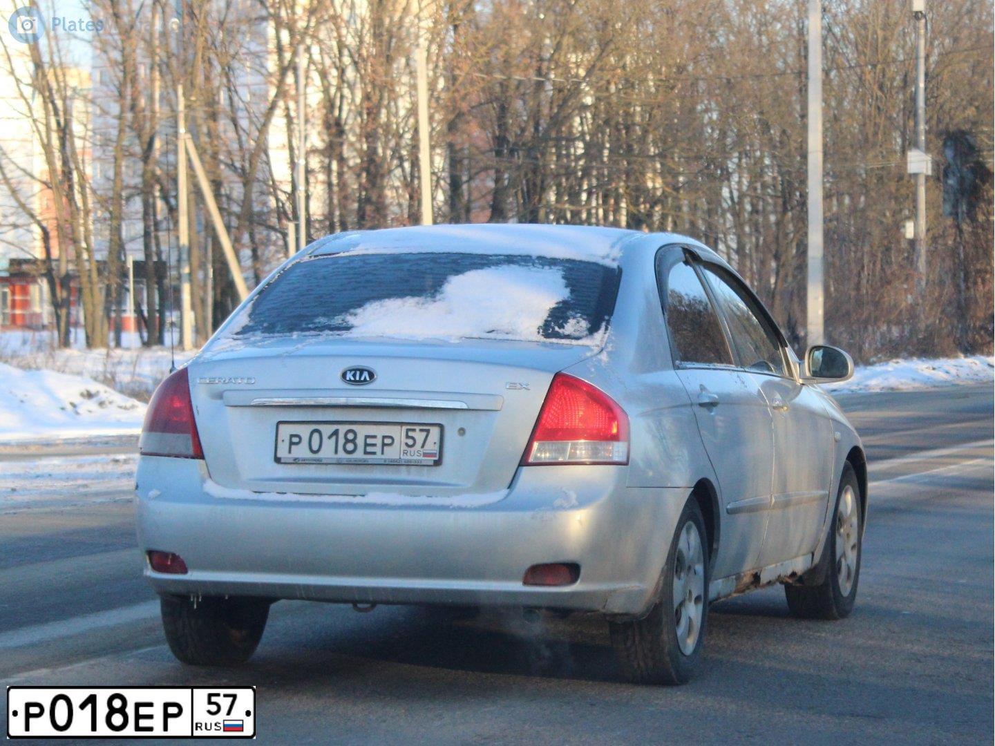 Фото автомобиля KIA CERATO, 2007 — госномер Р018ЕР57. Цвет: серебристый