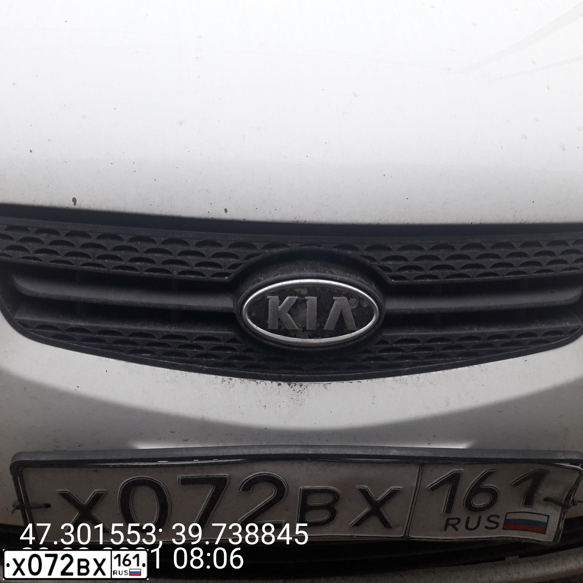 Фото автомобиля KIA RIO, 2009 — госномер Х072ВХ161. Цвет: БЕЛЫЙ