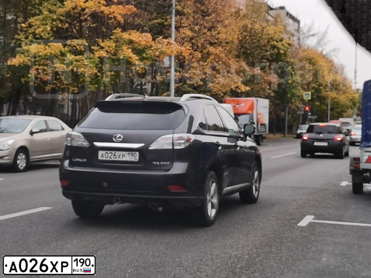 Фото автомобиля LEXUS RX, 2009 — госномер А026ХР190. Цвет: КОРИЧНЕВЫЙ ТЕМНЫЙ