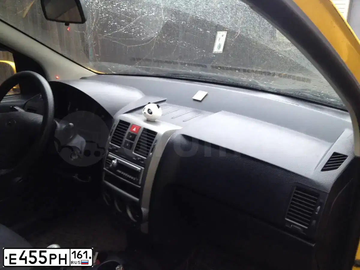 Фото автомобиля HYUNDAI GETZ, 2005 — госномер Е455РН161. Цвет: ЯРКО-ЖЕЛТЫЙ