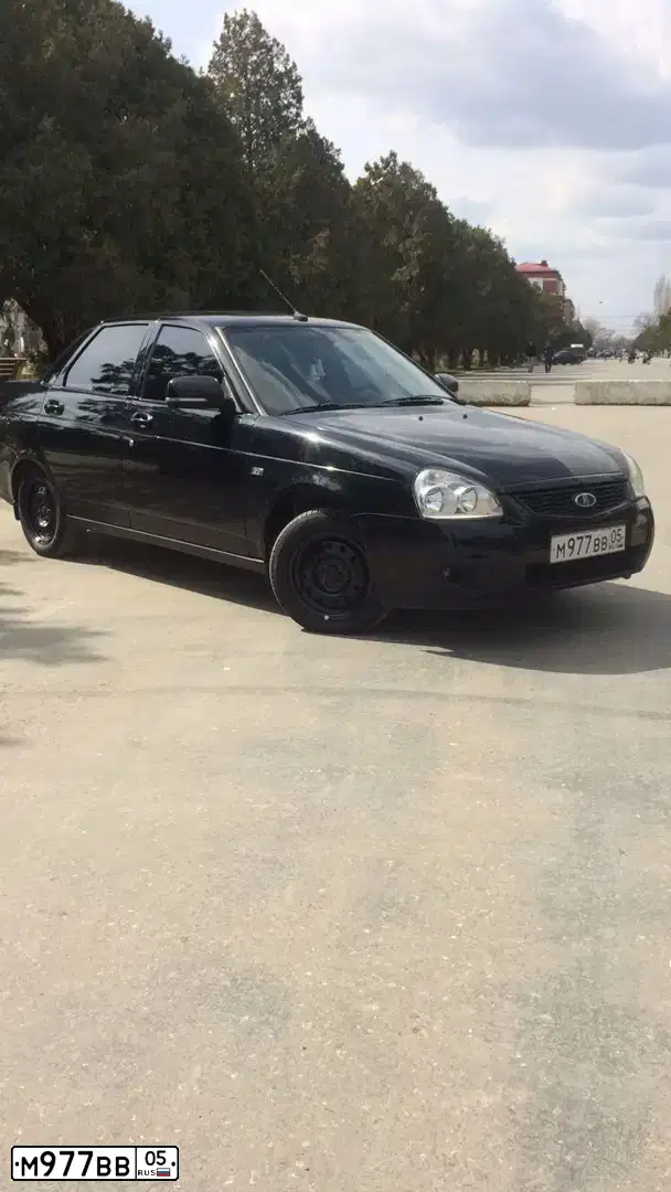Фото автомобиля LADA 2170 PRIORA, 2012 — госномер М977ВВ05. Цвет: СИНЕ ЧЕРНЫЙ