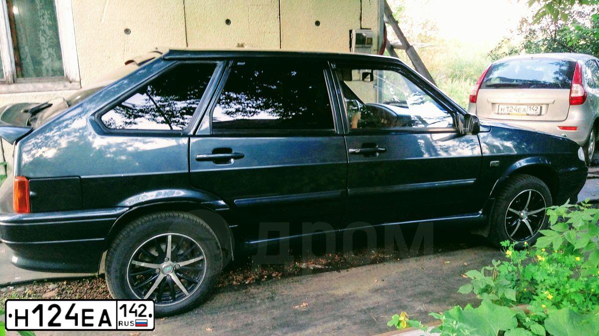Фото автомобиля LADA 2192 KALINA, 2013 — госномер Н124ЕА142. Цвет: серебристый