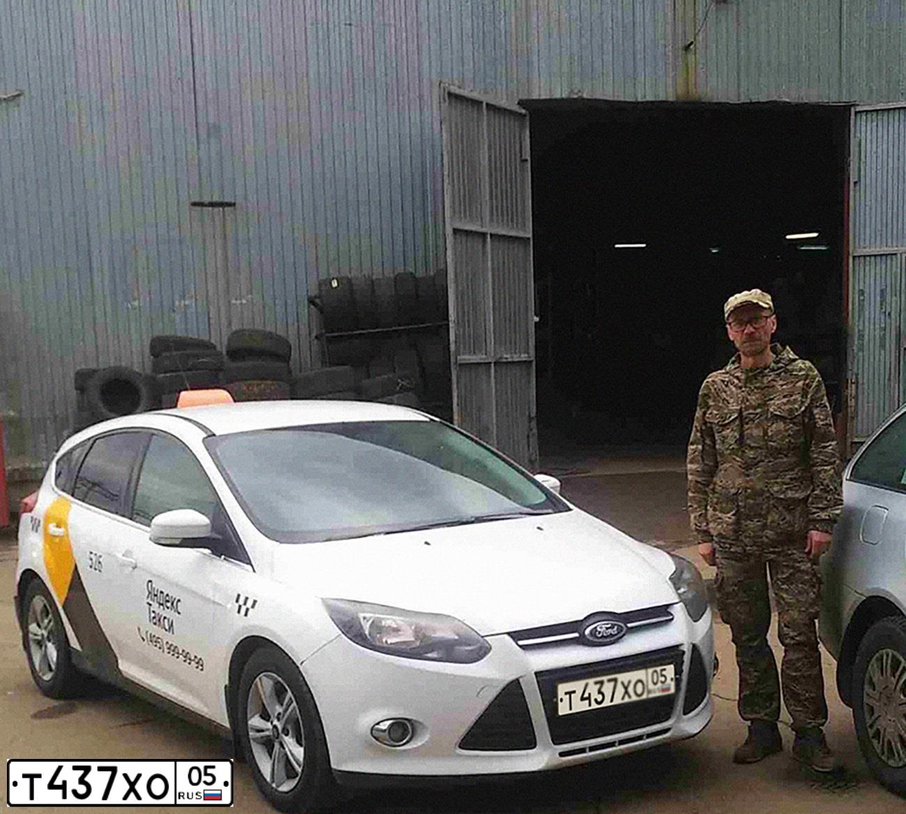 Фото автомобиля FORD FOCUS, 2011 — госномер Р014ЕМ32. Цвет: БЕЛЫЙ