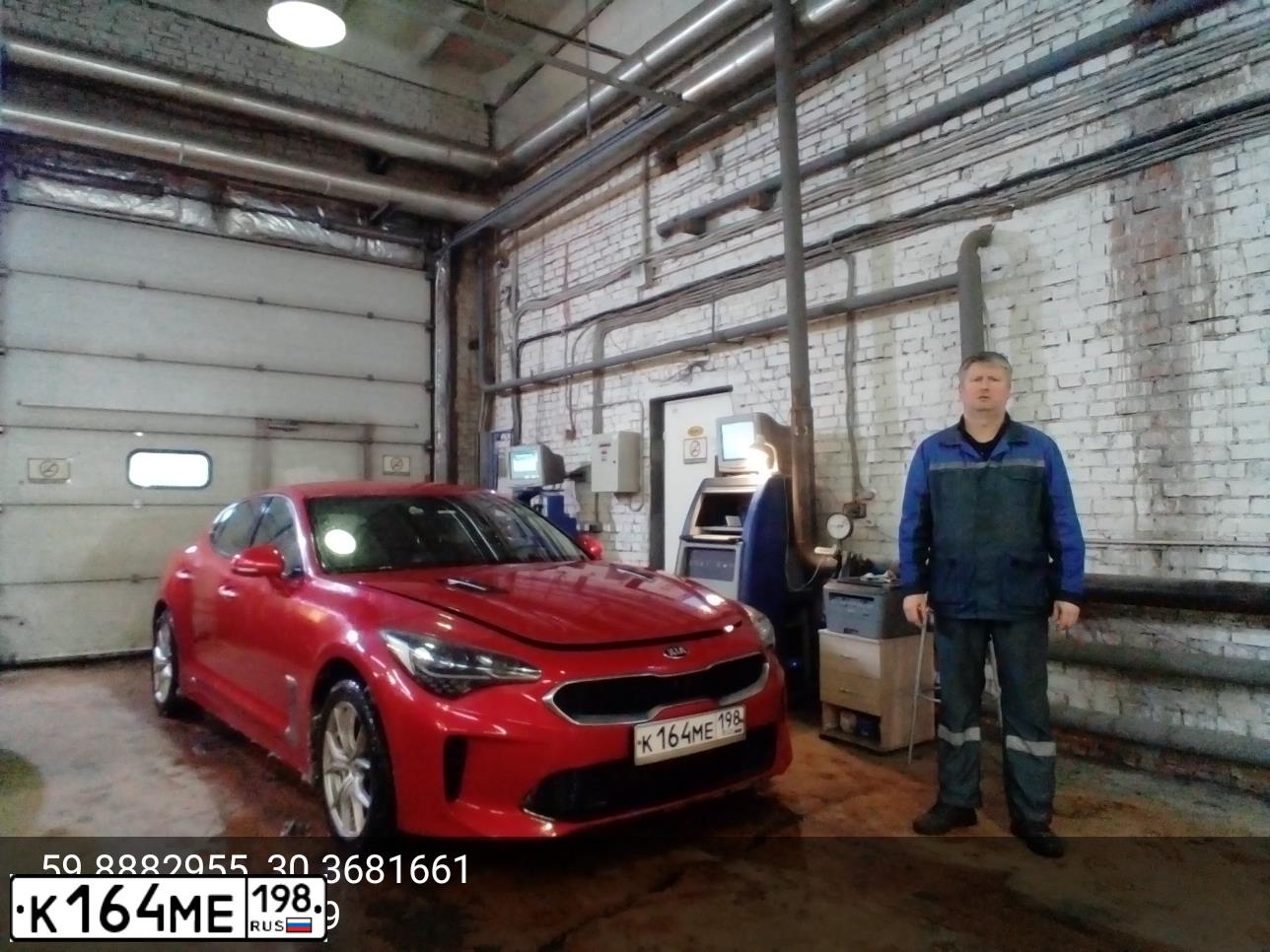 Фото автомобиля KIA STINGER, 2019 — госномер Р919МК82. Цвет: Красный
