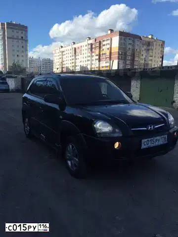 Фото автомобиля HYUNDAI TUCSON, 2008 — госномер С015РУ116. Цвет: ЧЕРНЫЙ