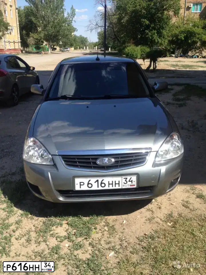Фото автомобиля LADA PRIORA, 2012 — госномер Н877ОР134. Цвет: СРЕДНИЙ СЕРО-ЗЕЛЕН МЕТ.