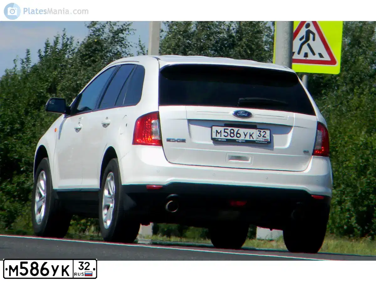 Фото автомобиля FORD EDGE, 2014 — госномер М586УК32. Цвет: БЕЛЫЙ