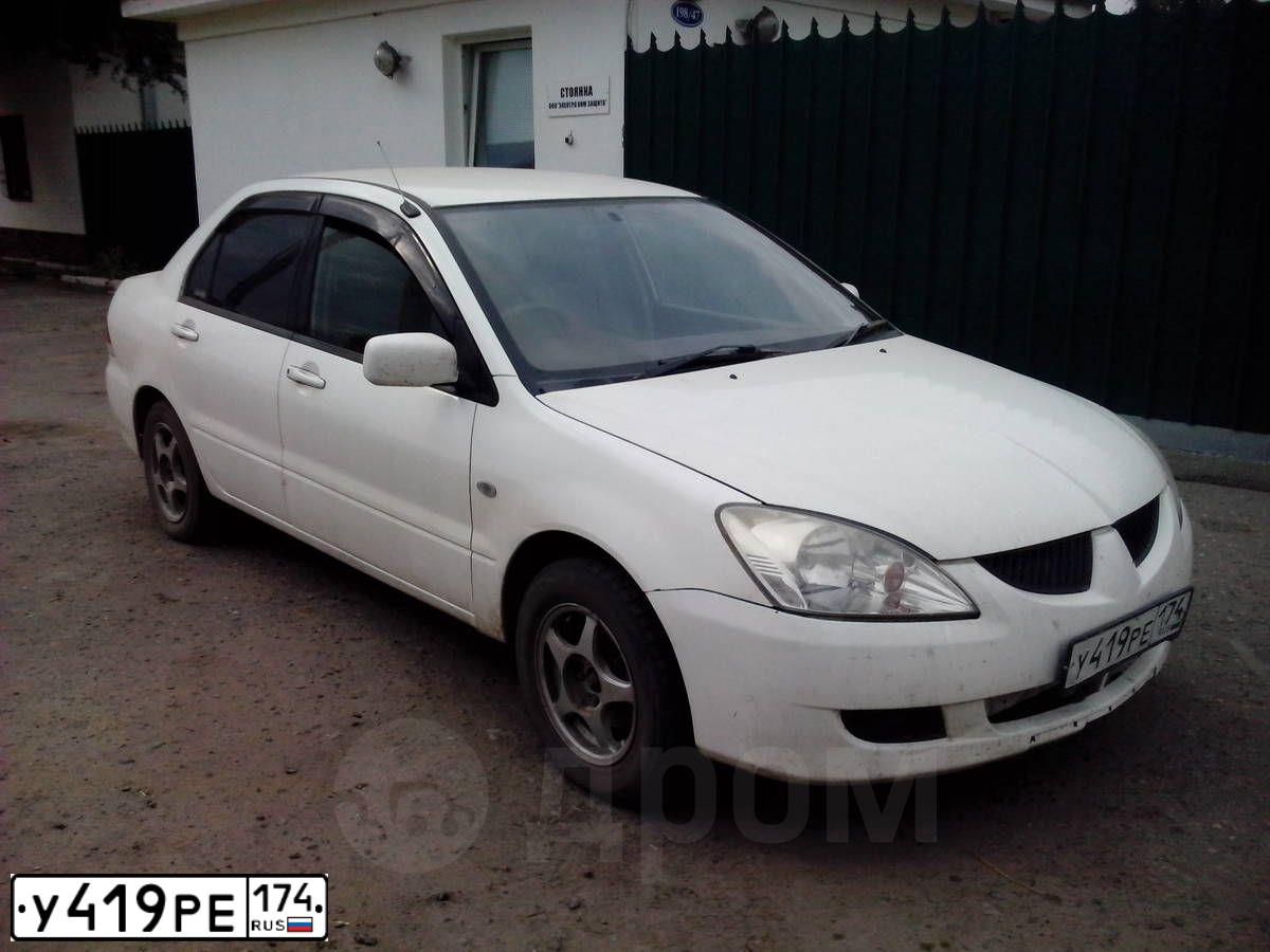 Фото автомобиля MITSUBISHI LANCER, 2003 — госномер В830КУ125