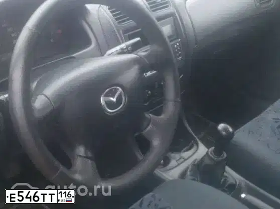 Фото автомобиля MAZDA A 323, 2000 — госномер Е546ТТ116. Цвет: СЕРЕБРИСТЫЙ