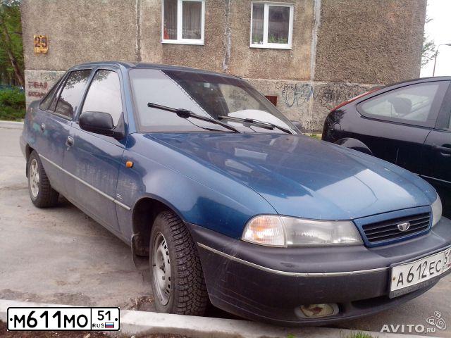 Фото автомобиля FORD FOCUS, 2006 — госномер М611МО51. Цвет: ЧЕРНЫЙ