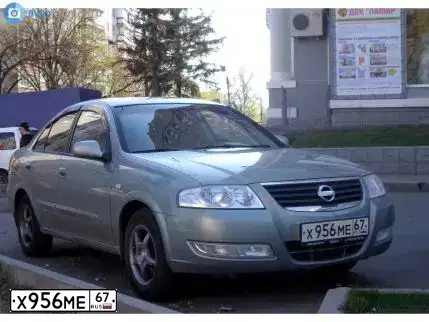 Фото автомобиля NISSAN ALMERA, 2007 — госномер А008СТ67. Цвет: СЕРО-ЗЕЛЕНЫЙ