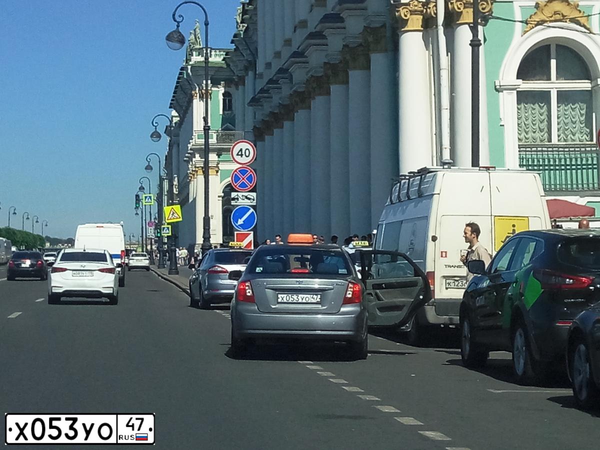 Фото автомобиля DAEWOO GENTRA, 2013 — госномер Х053УО47. Цвет: ТЕМНО-СЕРЫЙ