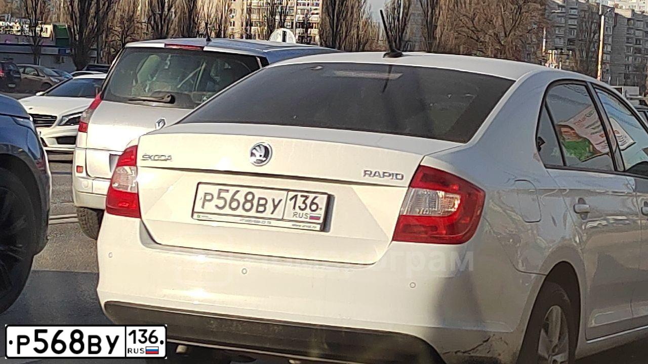 Фото автомобиля SKODA RAPID, 2017 — госномер Р779КС48. Цвет: Белый