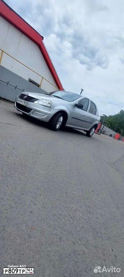 Фото автомобиля RENAULT LOGAN, 2013 — госномер Р809ТР161. Цвет: СЕРЫЙ СВЕТЛЫЙ