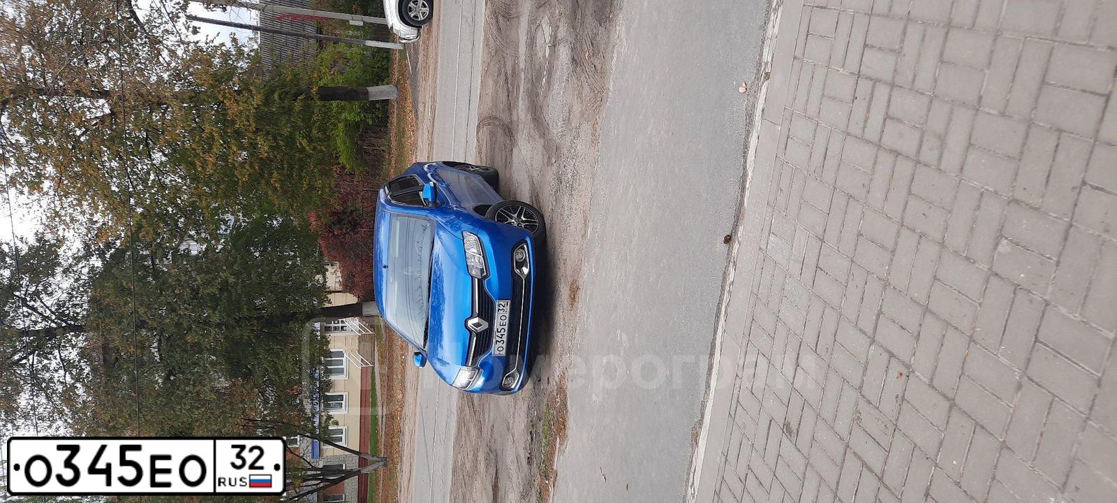 Фото автомобиля RENAULT LOGAN, 2014 — госномер О345ЕО32. Цвет: СВЕТЛО-СИНИЙ