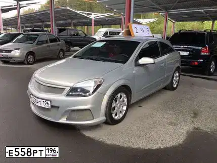 Фото автомобиля OPEL ASTRA, 2008 — госномер Е906НС196. Цвет: БЕЖЕВО-СЕРЫЙ
