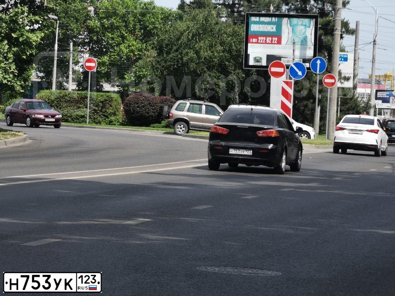 Фото автомобиля MITSUBISHI LANCER, 2007 — госномер А188СХ124. Цвет: ЧЕРНЫЙ