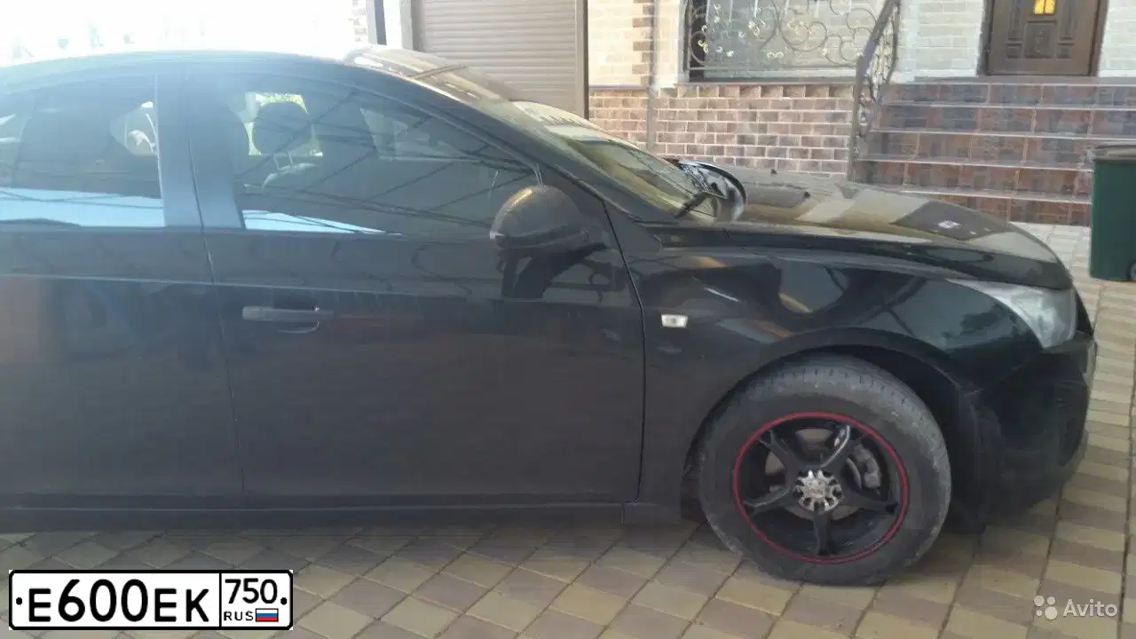 Фото автомобиля CHEVROLET CRUZE, 2013 — госномер А165АЕ550. Цвет: ЧЕРНЫЙ МЕТАЛЛИК