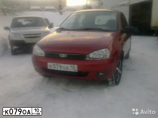 Фото автомобиля LADA 1117 KALINA, 2010 — госномер К079ОА10. Цвет: СЕРЕБРИСТО-КРАСНЫЙ