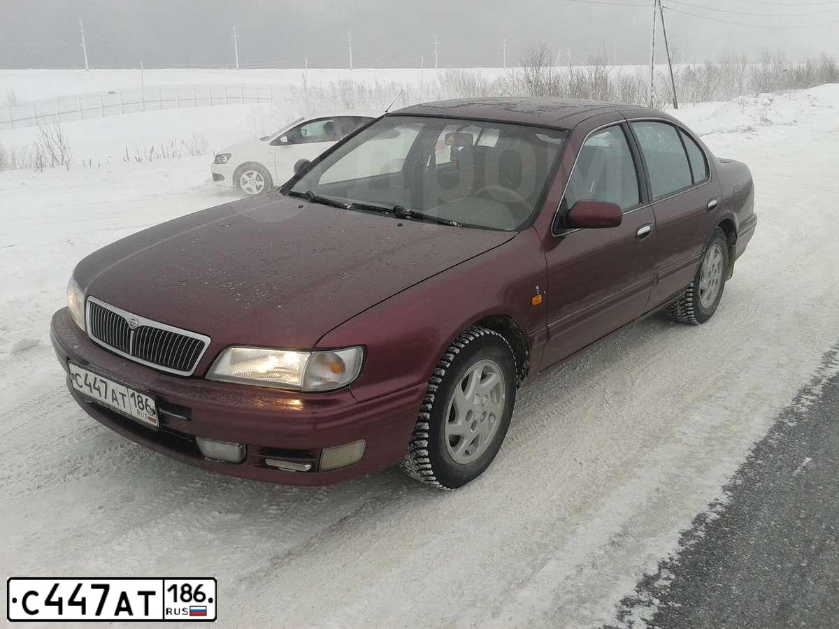 Фото автомобиля NISSAN MAXIMA, 1997 — госномер С447АТ186. Цвет: КРАСНЫЙ(ВИШНЕВЫЙ)