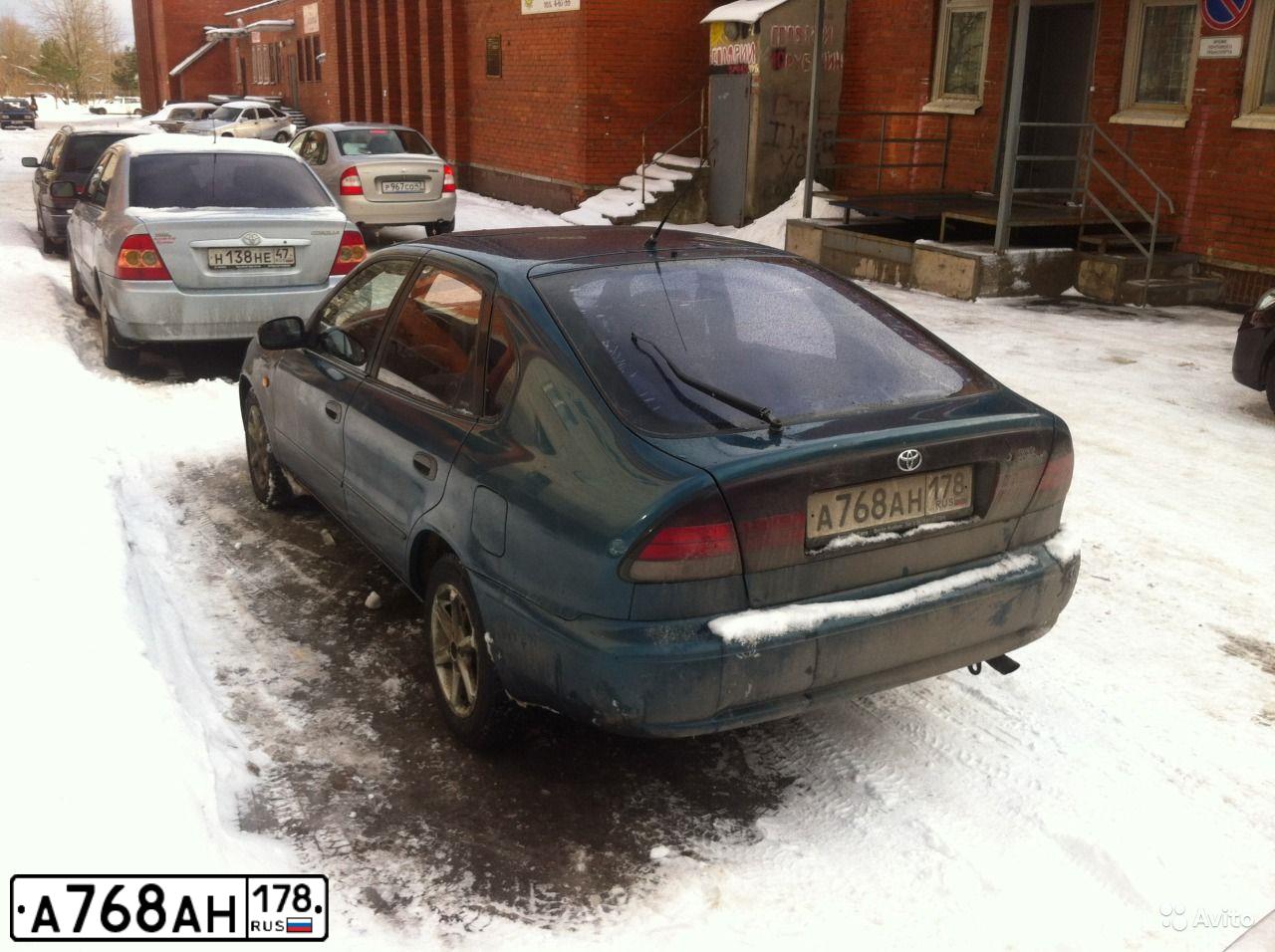 Фото автомобиля TOYOTA COROLLA, 1992 — госномер А768АН178. Цвет: Темно-зеленый
