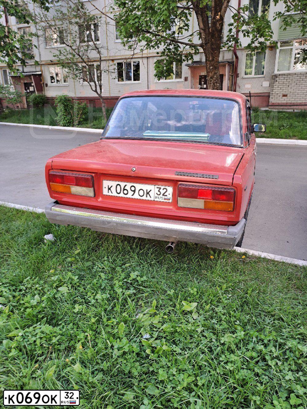 Фото автомобиля LADA 2107, 1996 — госномер К069ОК32. Цвет: Красный