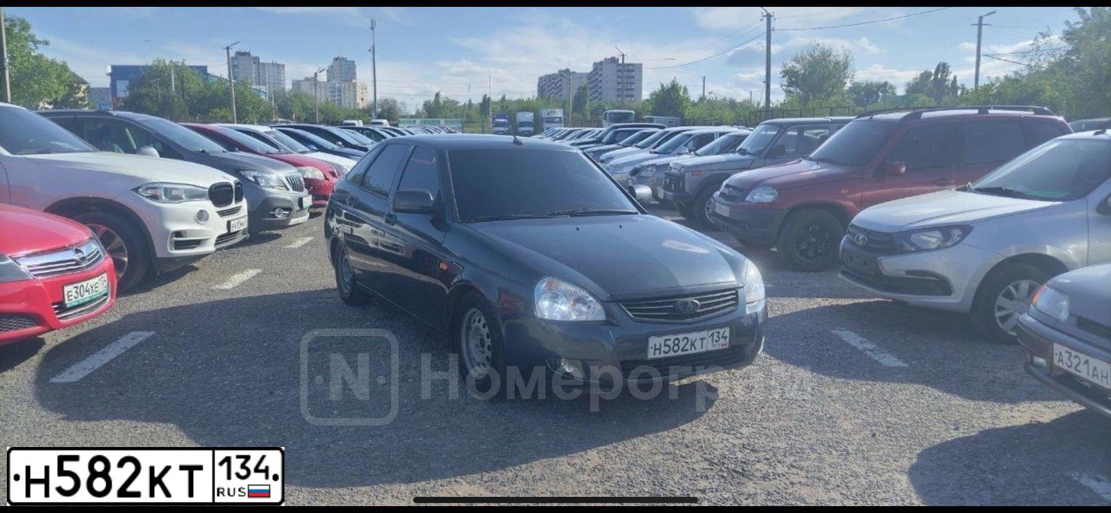 Фото автомобиля LADA PRIORA, 2012 — госномер О894НС134. Цвет: СЕРО СИНИЙ