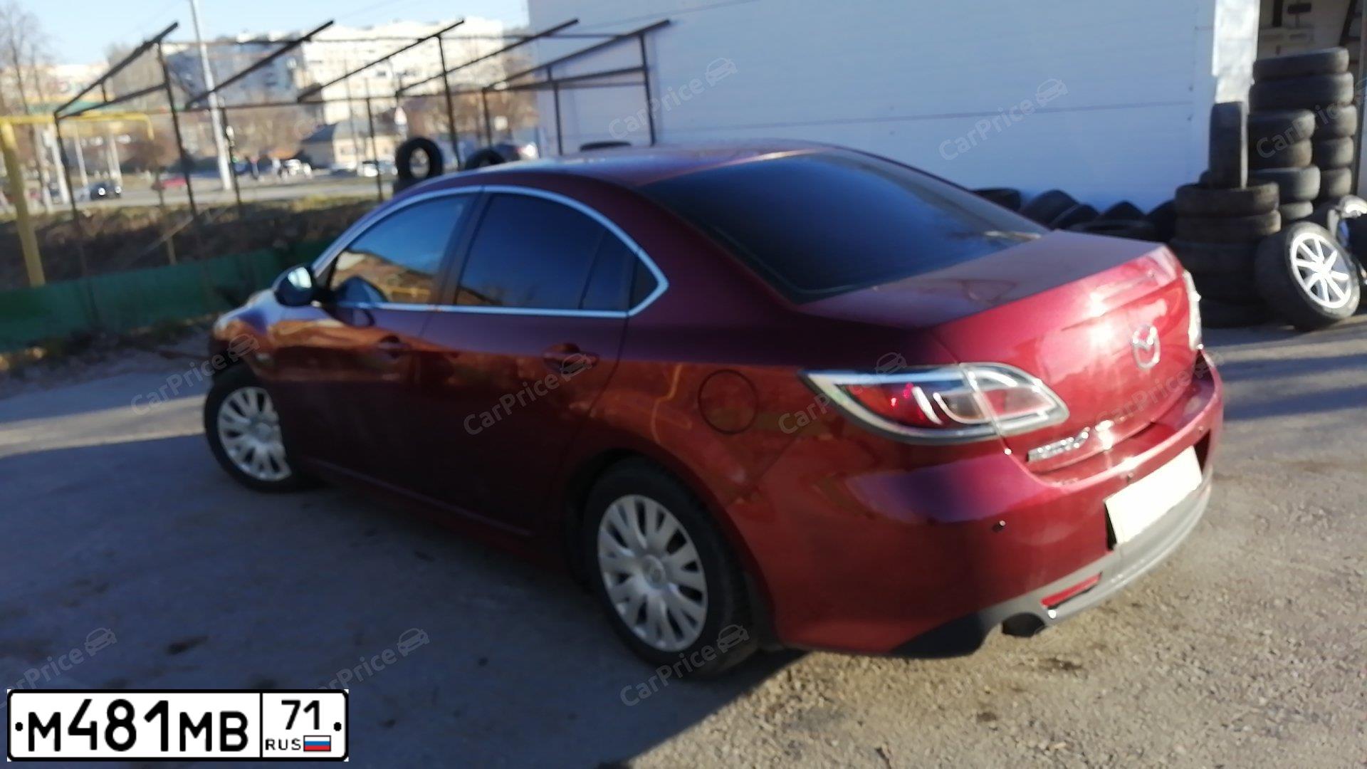 Фото автомобиля MAZDA 6, 2011 — госномер Н703КС21. Цвет: КРАСНЫЙ