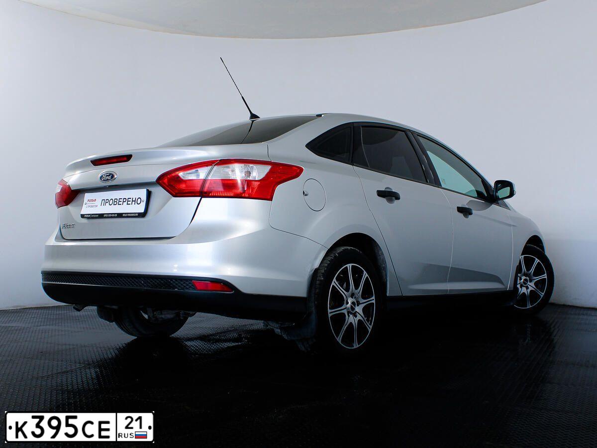 Фото автомобиля FORD FOCUS, 2012 — госномер К395СЕ21. Цвет: Серебристый