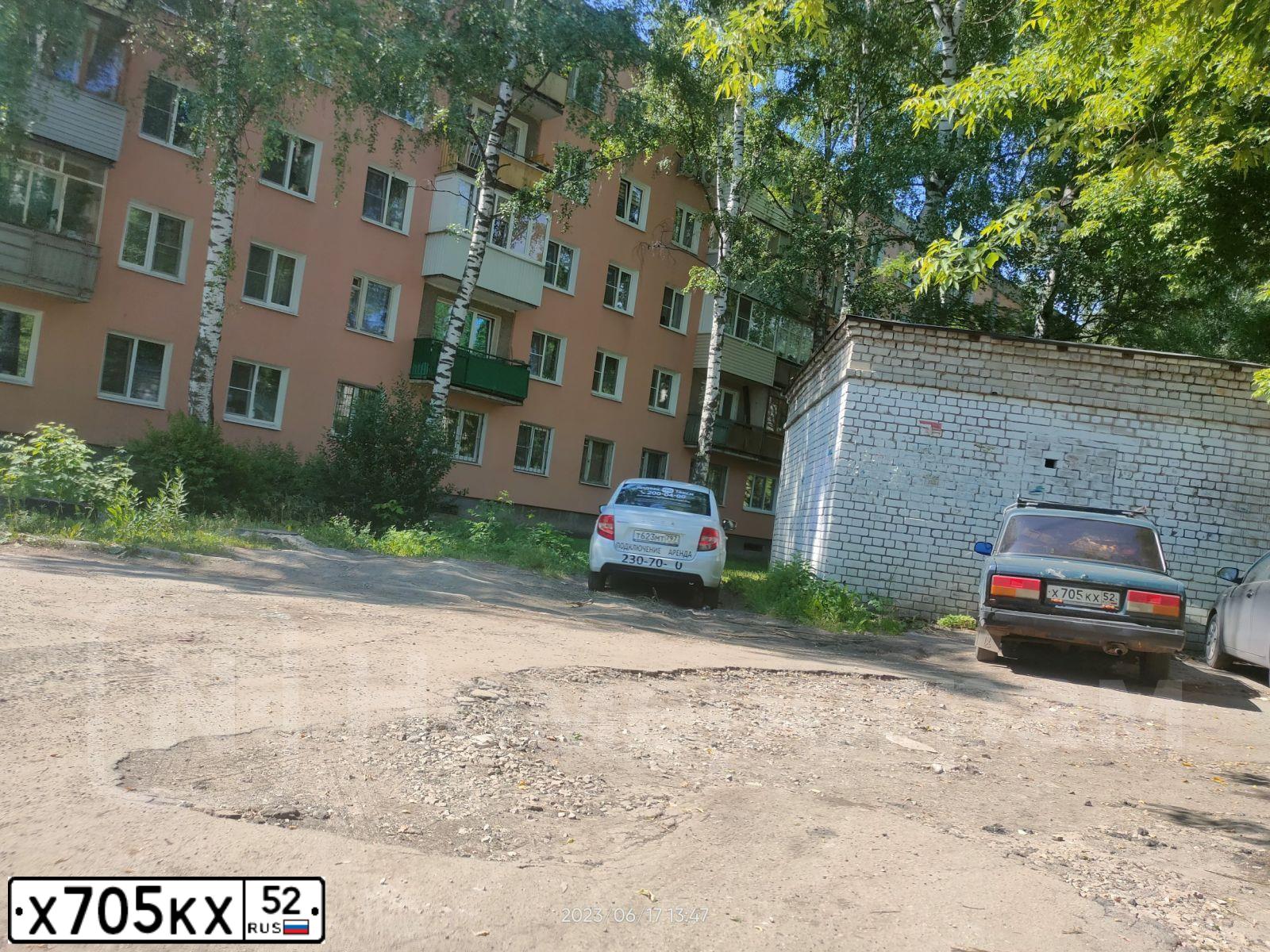 Фото автомобиля LADA 2107, 2005 — госномер Х705КХ52. Цвет: ТЕМНО-ЗЕЛЕНЫЙ