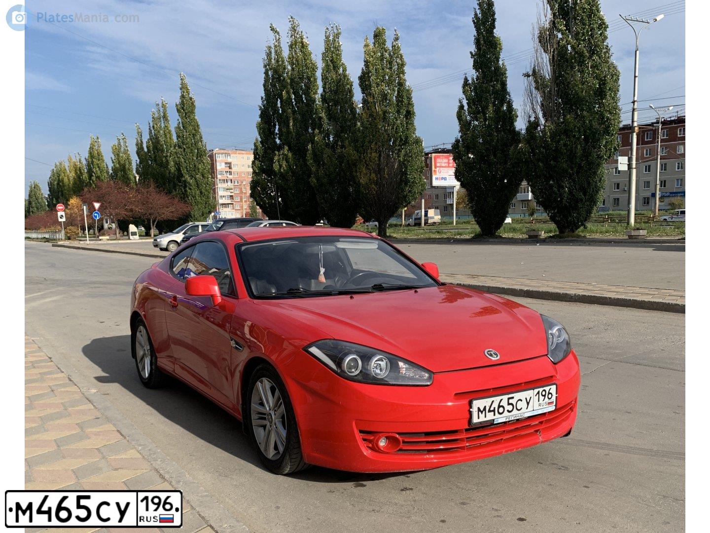 Фото автомобиля HYUNDAI /S-/COUPE / TUSCANI, 2008 — госномер М465СУ196. Цвет: Красный