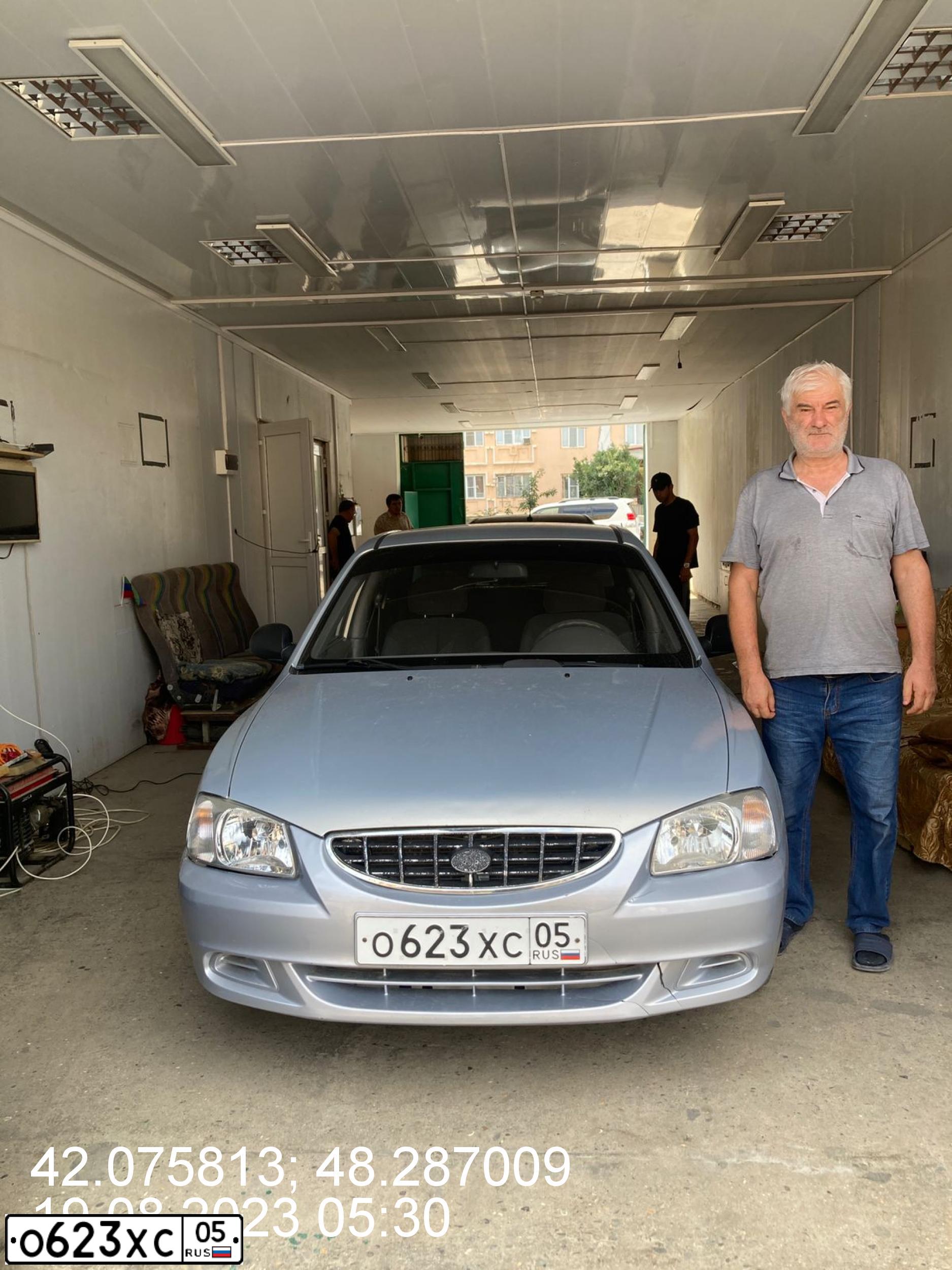 Фото автомобиля TAGAZ ACCENT, 2008 — госномер О623ХС05. Цвет: серебристый