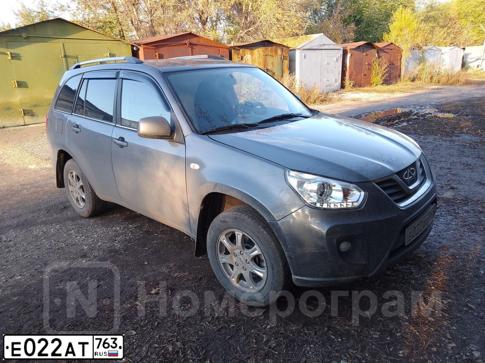 Фото автомобиля CHERY TIGGO, 2015 — госномер Е022АТ763. Цвет: СТАЛЬНОЙ (СЕРЫЙ)