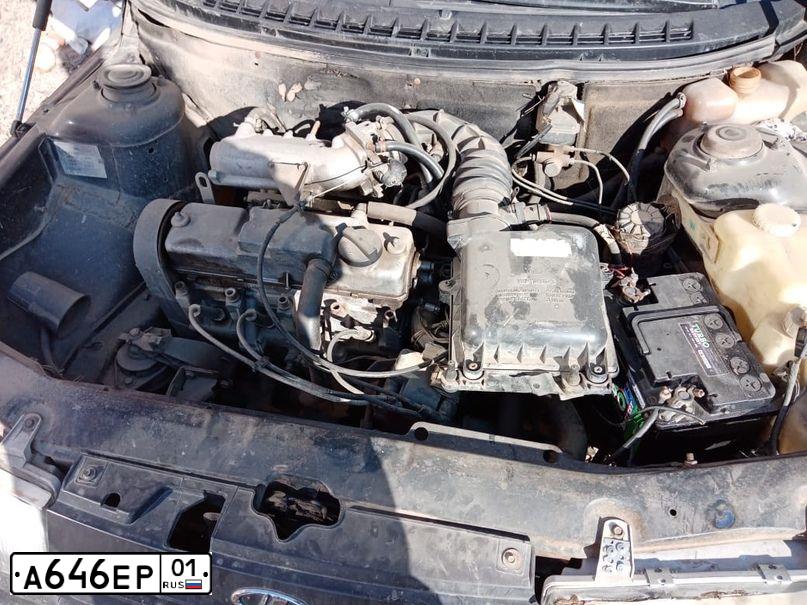 Фото автомобиля LADA 2110, 1998 — госномер В646ЕР01. Цвет: ЧЕРНЫЙ