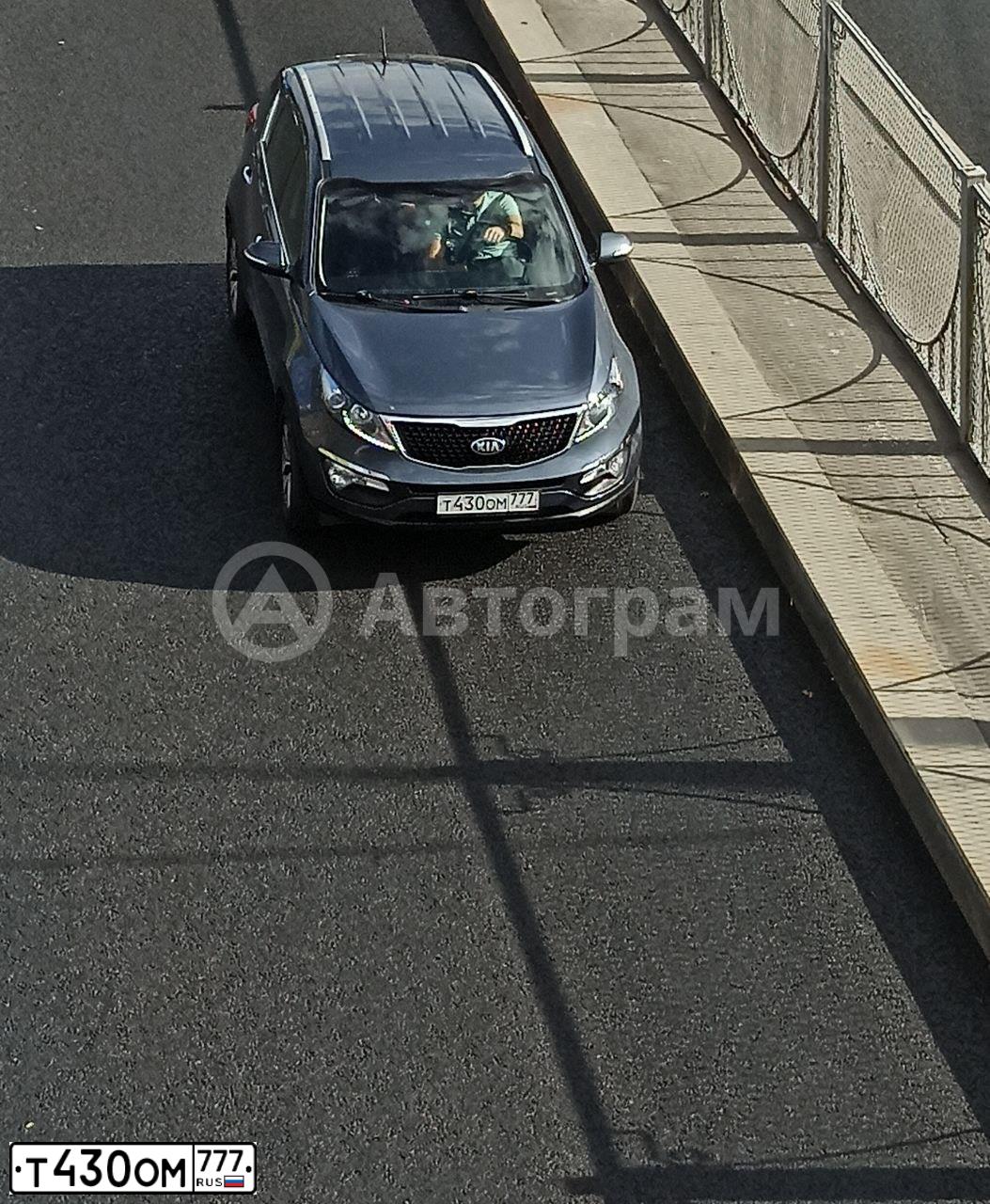 Фото автомобиля KIA SPORTAGE, 2015 — госномер Т430ОМ777. Цвет: синий
