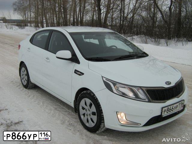 Фото автомобиля KIA SPORTAGE, 2012 — госномер Р718УУ11. Цвет: ОРАНЖЕВЫЙ