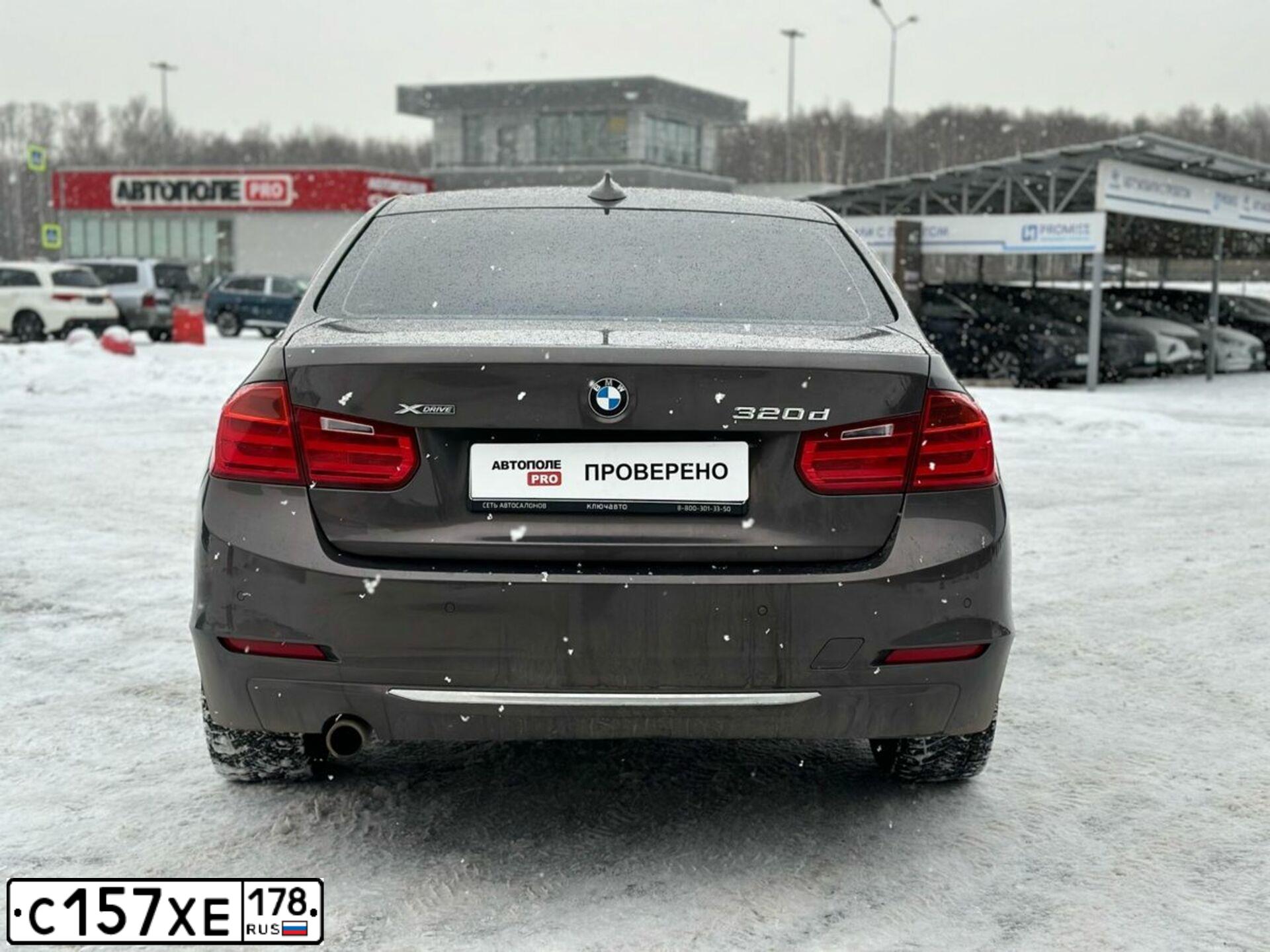 Фото автомобиля BMW SERIE 3, 2014 — госномер Р897ЕК977. Цвет: Коричневый