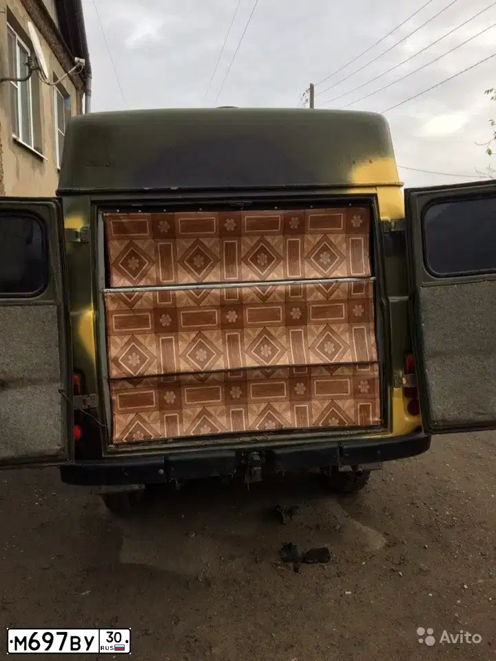 Фото автомобиля UAZ 3962, 1990 — госномер М697ВУ30. Цвет: ЧЕРНО-ЗЕЛЕНЫЙ