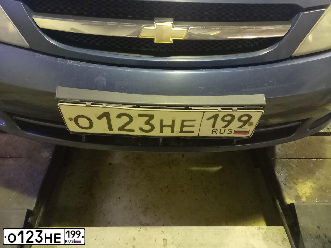 Фото автомобиля CHEVROLET LACETTI, 2006 — госномер О123НЕ199. Цвет: синий