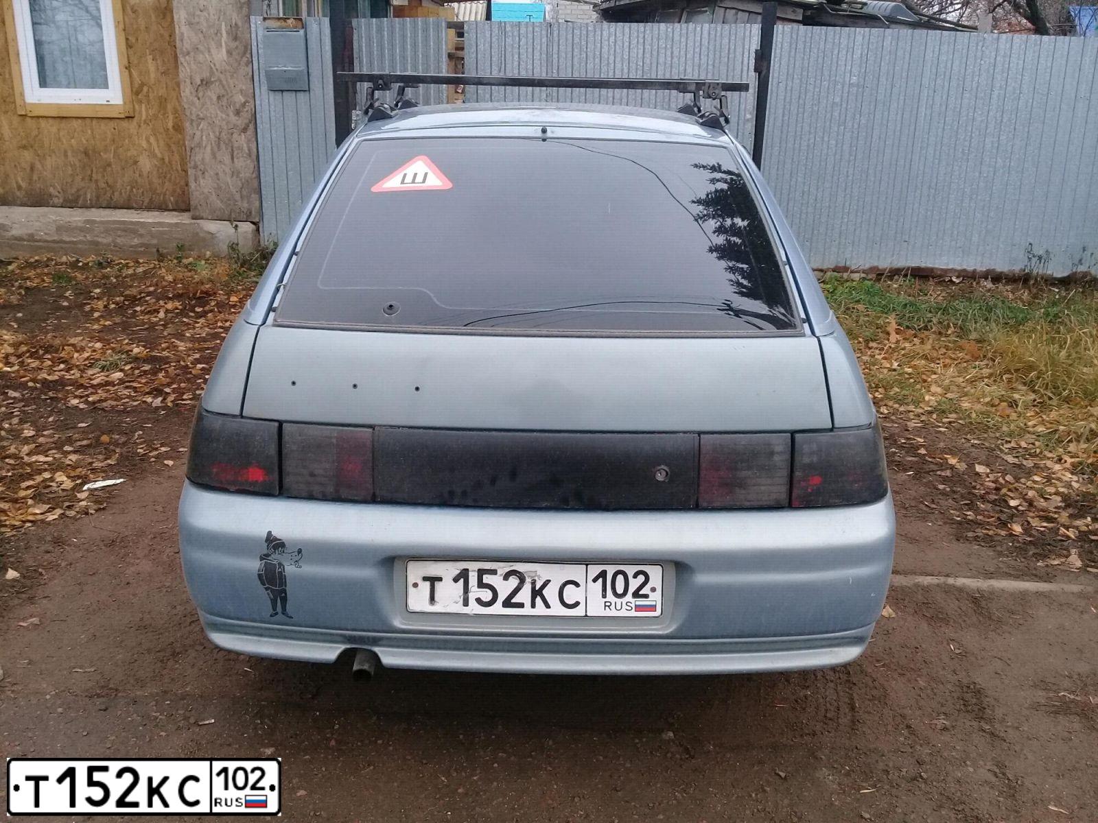 Фото автомобиля LADA 2112 LADA, 2004 — госномер Е473ВХ702. Цвет: ЗОЛОТИСТО-СЕРЫЙ