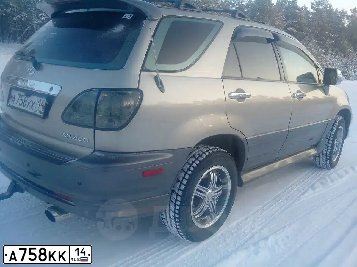 Фото автомобиля LEXUS RX, 2001 — госномер Т604НО14. Цвет: БЕЖЕВЫЙ