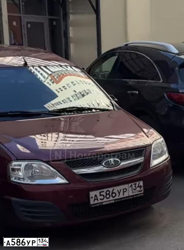 Фото автомобиля LADA LARGUS, 2014 — госномер А586УР134. Цвет: КРАСНЫЙ