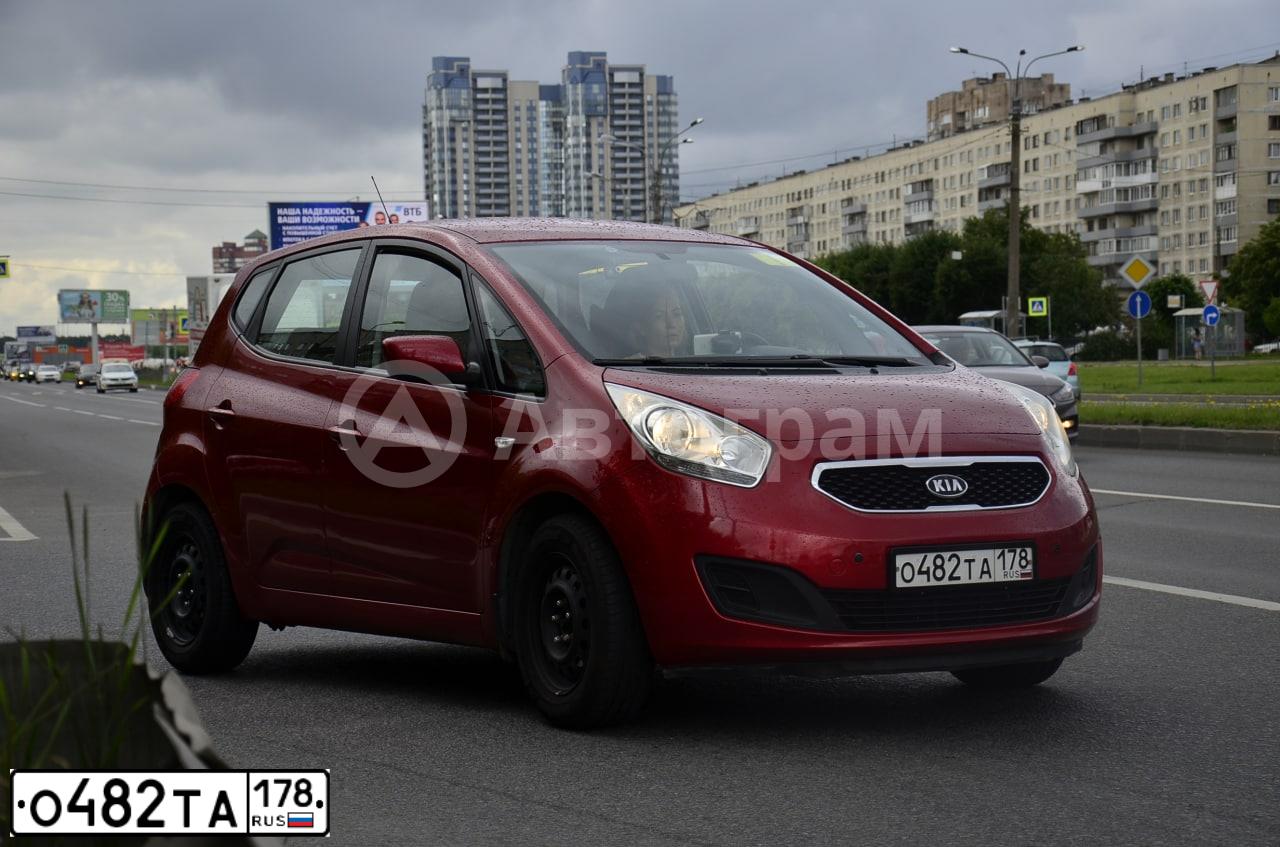 Фото автомобиля KIA VENGA, 2011 — госномер О482ТА178. Цвет: Красный