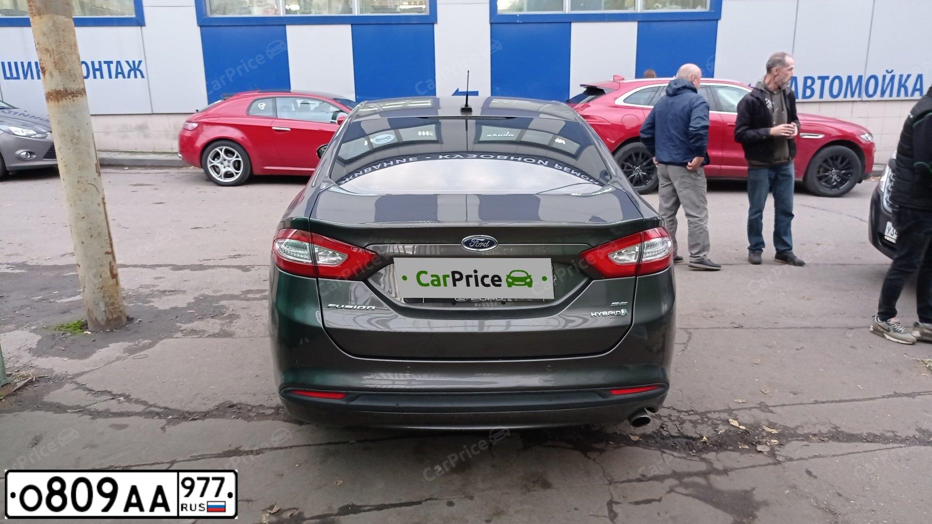 Фото автомобиля FORD ФОРД ФЬЮЖН, 2015 — госномер О809АА977. Цвет: БЕЛЫЙ-ЖЕЛТЫЙ-СЕРЫЙ