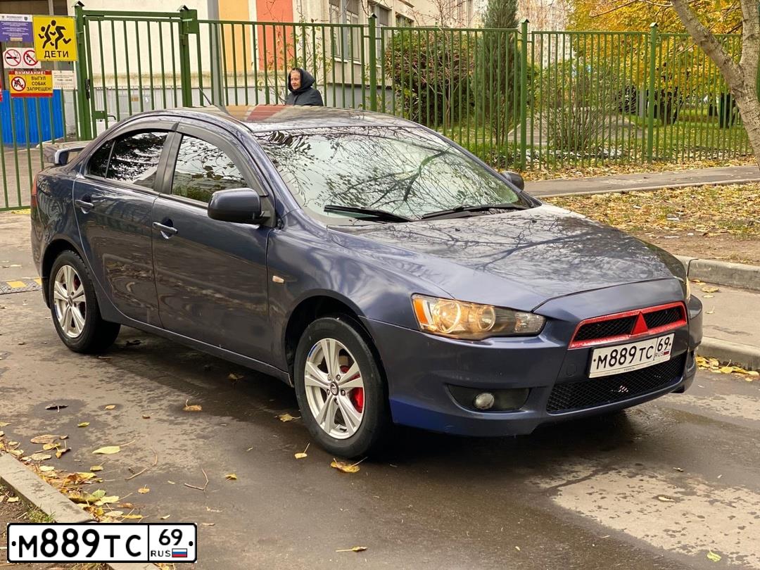 Фото автомобиля MITSUBISHI LANCER, 2008 — госномер М889ТС69. Цвет: синий