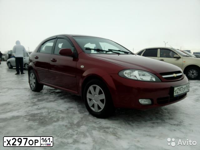 Фото автомобиля CHEVROLET LACETTI, 2006 — госномер Н110ОК82. Цвет: КРАСНЫЙ ТЕМНЫЙ