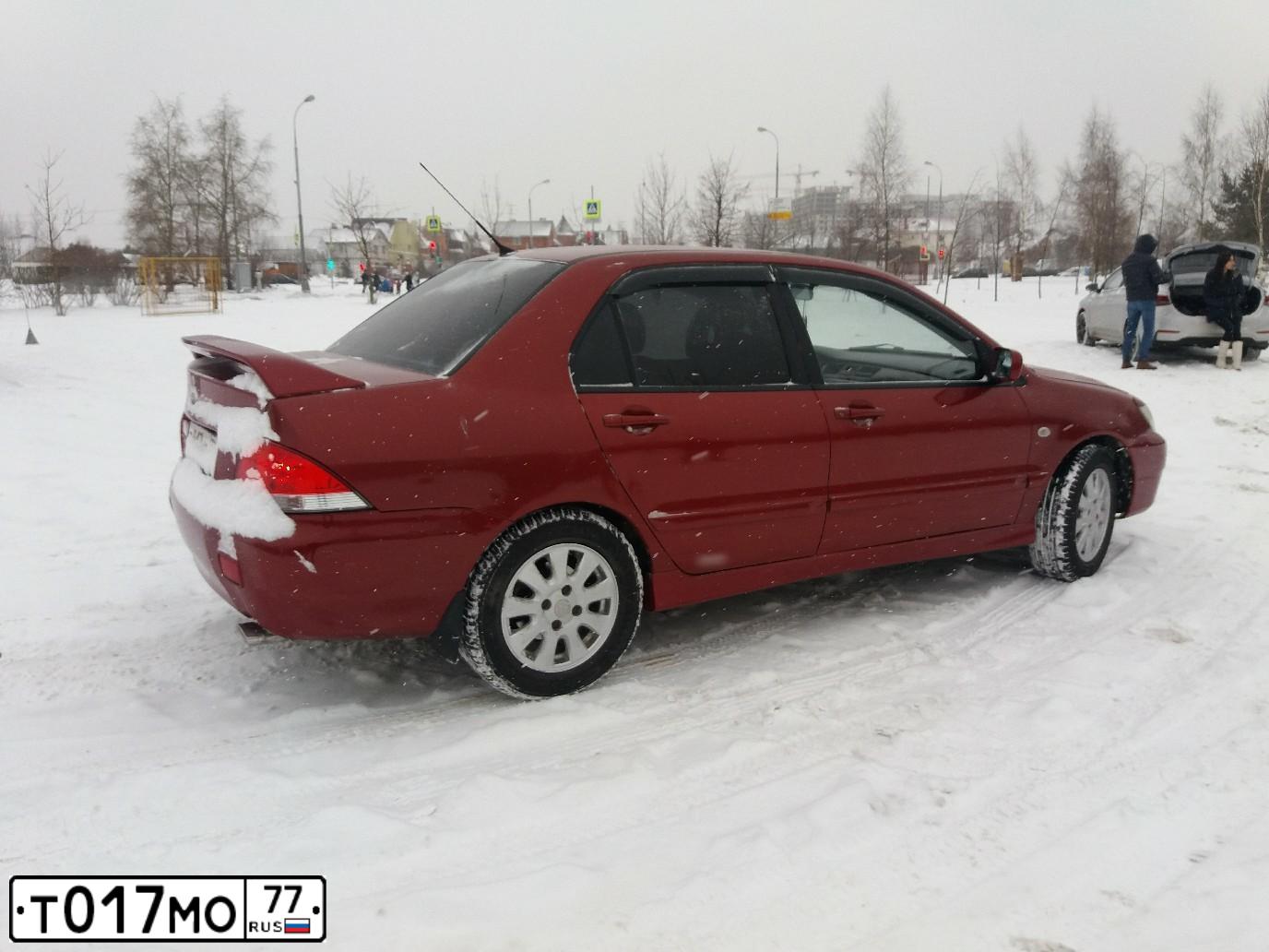 Фото автомобиля MITSUBISHI LANCER, 2005 — госномер М954СО40. Цвет: Красный