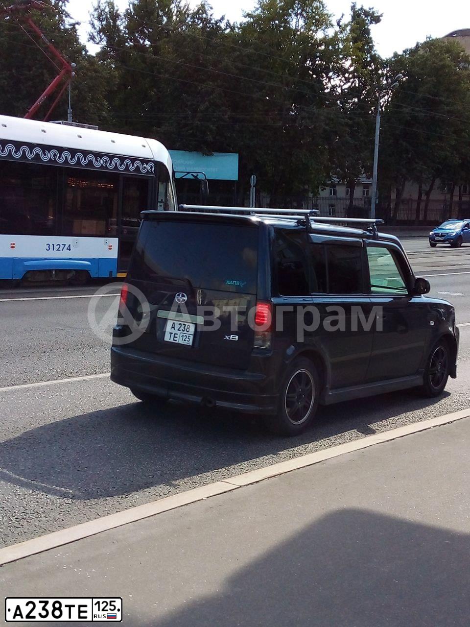 Фото автомобиля SCION XB, 2004 — госномер У855УР57. Цвет: Темно-синий