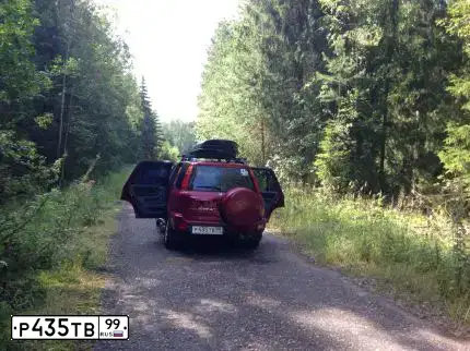 Фото автомобиля HONDA CR-V, 2001 — госномер Р435ТВ99. Цвет: КРАСНЫЙ